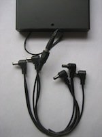 Rechargeable 9V power supply for guitar pedals with a Godlyke 5-point daisy chain cable attached